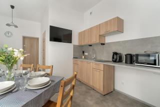 Elegancki i Stylowy Apartament Niedaleko Rynku w Poznaniu by Noclegi Renters - 1