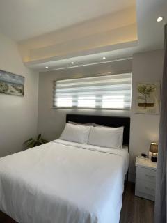 A minimalist and spacious 1Br condo at Amani Grand Resort Residences Mactan near MCIA - 8