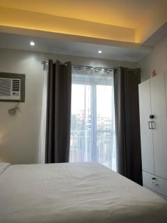 A minimalist and spacious 1Br condo at Amani Grand Resort Residences Mactan near MCIA - 4