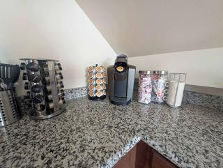 Vaulted-Ceiling Studio · Full Kitchen + Laundry - 1