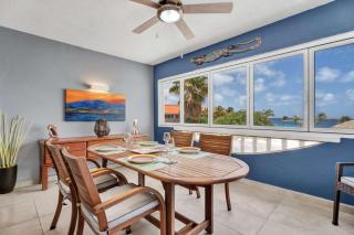 Sand Dollar Golden Hour F16 with sea views air conditioning in the living room and a central location in Hato - 2