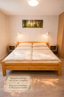 Erholung pur in der Strandhussiedlung Rügen - Bungalow Ferienwohnung - bis 5 Personen - nur 100m zum Naturstrand - mitten im Kiefernwald - Ideal für Paare & Familien - Hunde herzlich willkommen - 6
