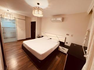 Fully Furnished Warm House at Center of Madinaty - 9