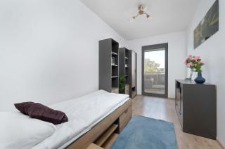 Spacious Apartment with a Balcony and a Remote Work Space by Noclegi Renters - 8