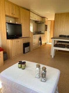 Stacaravan in Friesland met schitterend uitzicht over het meer! Op het 5-sterren vakantiepark De Kuilart - 6
