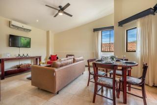 Sunny 2BR: Balcony, Pool, Kitchen, Walk to Beach - 3