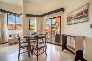 Sunny 2BR: Balcony, Pool, Kitchen, Walk to Beach - 1