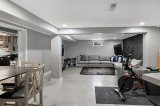 Modern 4BR Retreat Fireplace, Bar & Workspace - 3