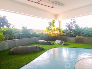 Comfort and Best Deal Studio at Grand Kamala Lagoon Apartment By Travelio - 1