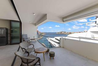 CuraCondo - Panoramic sunset & Harbor Views - 7