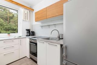 Family Apartment with a Balcony Near Green Spaces by Noclegi Renters - 7
