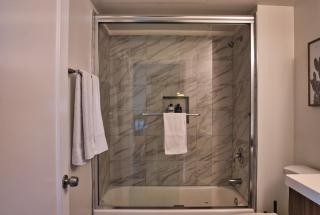 Luxury 3BR Spacious Suite Sleeps 8 Guests with Patio, Skyline View, Optional Parking and Gym Access Near McCormick Place and Lakefront - 1