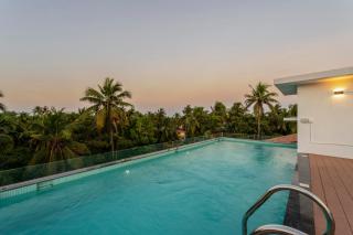 Staymaster Sleek - 1BR Serviced Apartment with Rooftop Pool & Balcony in Calangute - 0