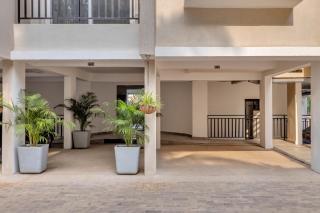 Palms Umiya by Hireavilla - 2BHK Apartments with Pool & Gym 1km from Candolim Beach - 2