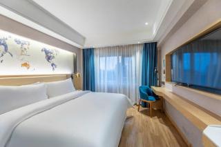Kyriad Marvelous Hotel Yiyang Xiufeng Park - 3