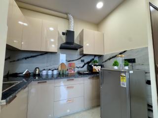 Modern Apartment in Gurugram Near Metro with Rooftop View, Designer Decor & Prime Location for Business or Leisure Stays - 9