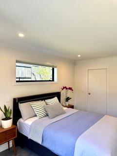 Modern ensuite master bedroom in a shared home - 2