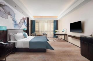 Xana Deluxe Hotel Hetian Chuanyi Kaixuan Road - 1