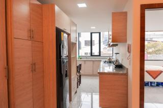 Suite moderna con vista, gym y garaje en Quito - 5
