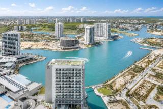 2BR Puerto Cancun with Rooftop Pool Gym & Marina - 9