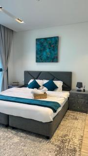 Holiday Homes, Entire 4BR Villa with Pool & Beach Access - 1