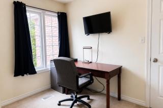 Private King Bedroom with TV, Workspace, Dresser & Mini Fridge in Brampton Shared Home - 3 Baths, Full Kitchen, WiFi, Laundry & Deck - Near GO Station, Ideal for Work & Couples! - Brampton - 8