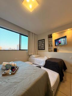 Flat Completo para 4 pessoas - 5 min Aeroporto Praia Shopping - 6