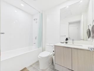 Spacious 3BR 2BA Condo Near King George SkyTrain - 1