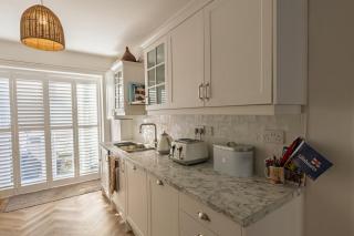 Central Swanage Apartment with Patio & Parking Steps from Beach & Pier - 7