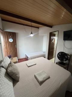 Suíte, situada na Casa Pé na Areia 027 - 9