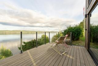 High ceilings and lake views over the inlet - 9