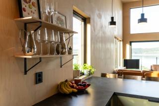 High ceilings and lake views over the inlet - 4