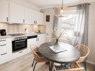 Nessmersiel, Renovierte Erdgeschosswohnung mit Garten, in Deichnähe, Wallbox, - 7