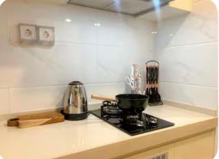 Apartment Sky House BSD with Smart TV 43 inch by Nobizen Japandi Living - 1