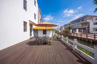 途庐荟酒店 浦东机场店 Tulu Hui Hotel provides 24 hour free airport and Disneyland shuttles An elegant courtyard with sun loungers laundry and food delivery services Finely designed rooms for a pleasant - 8