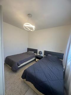 Easy access 2-BR apartment in B15 in Madinaty - 5