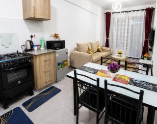 Zuri Cozy Stays, Grand Midtown Apartments, Ngara - 9