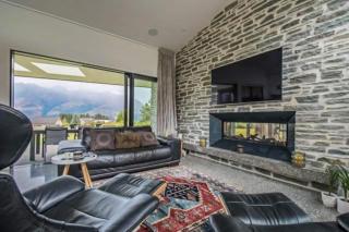 Oraka Lodge views outdoor fire and spa - 9