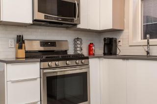Double Play Wrigley - Prime Location Across from Wrigley Field & Transit - 2BR Apts - 2