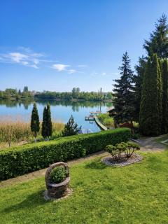 Dom nad jeziorem, własna linia brzegowa, łódka, rower wodny na wyłączność - 6