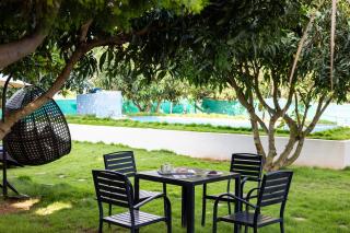 Eco Serenity Pet-friendly Charming 2-BHK Villa With Lush Garden, Gazebo, Private Pool & Open Dining Close to Nandi Hills - 1