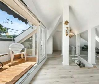 Above the rooftops of the city - duplex with balcony - 3
