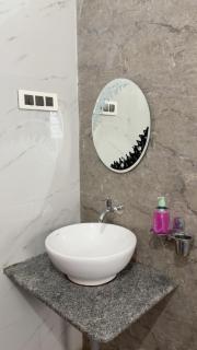 1bhk with 2 lake view Balconies and a pool just 5 mins away from beach - 9
