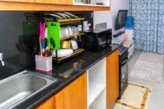 Stylish 1BR Near TRM Mall Royal Suburbs, Roysambu - 1