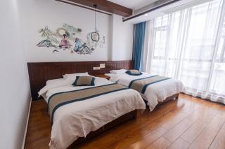 Zhangjiajie Highlights Guesthouse Free Fresh Coffee, Custom Travel Plans, Free Ticket Support, Free Self-service Laundry, Free Water & English-speaking Front Desk - 1