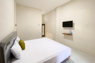 Urbanview Modern Guest House Jember - 5