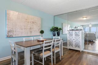 Updated first-floor open airy condo with great views - close to dining - 0