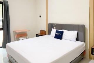 Urbanview Modern Guest House Jember - 0