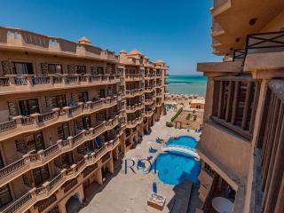 Sea View 1BR Apartment at Turtles Beach, Al Ahyaa - 0