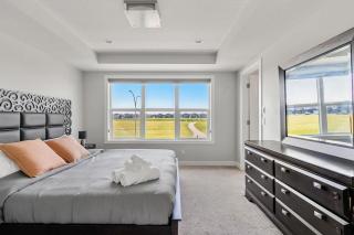 Cornerstone 3BR Home near Calgary Airport – King Ensuite, Fireplace, Double Garage - 2